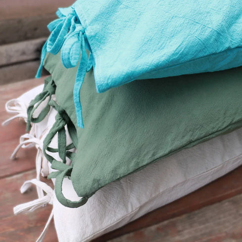 Long cushions with removable covers made of robust cotton house canvas